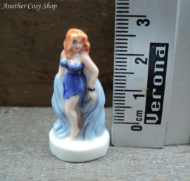 Statue pin up girl in short blue dress