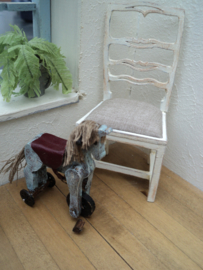 Dollhouse miniaiture toy horse on wheels