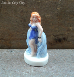 Statue pin up girl in short blue dress