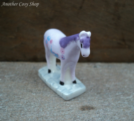 Statue lilac horse with painting