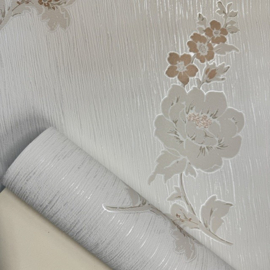 Landelijk bloemen behang beige zandkleuren met een subtiele glitterafwerking