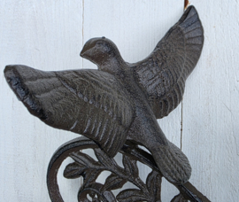 BEL MET VOGEL MET UITSLAANDE VLEUGELS
