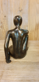 MAN MET STREKKENDE ARM