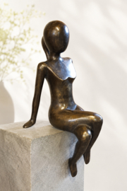 RANDZITTER / VROUW