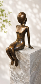 RANDZITTER / VROUW