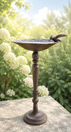 VOGELSCHAAL OP VOET