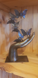 HAND MET 5 VLINDERS  / LINKERHAND