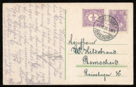 Briefkaart met langebalkstempel AMSTERDAM CENTR.STATION 3 naar Duitsland. op ansichtkaart Amsterdam.