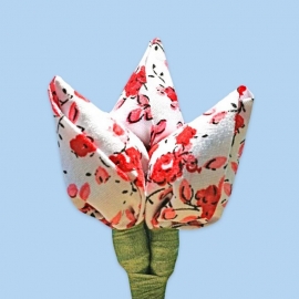 Tulp corsage wit met rode bloemen