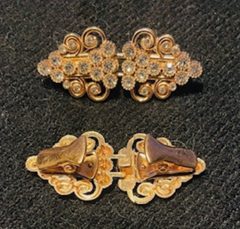 202605	Vestclip bling bling goudkl piramide ong 6 cm