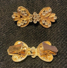 202606	Vestclip bling bling goudkl  tulpvorm ong 6 cm