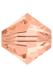 SW/136 - 4mm  Swarovski Bicone  5328 Light Peach / Per 50 stuks