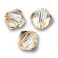 SW/121 - 4mm Swarovski  Bicone  5328 Golden Shadow   / Per 50 stuks