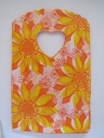 Witte tasjes met gele en oranje bloemen