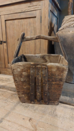 Oude bakken met handvat