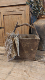 Oude bakken met handvat