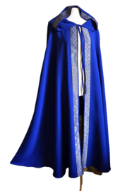Blauwe cape met sierband - goud