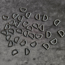 Kunstof D-ringen - zwart plat