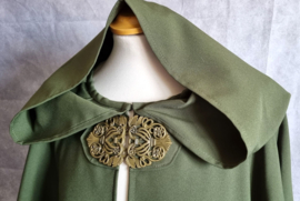 Lange groene cape