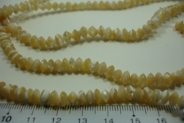 [ 10012 ] Troca Soucer Beads  +/-  5 mm. Naturel, per streng