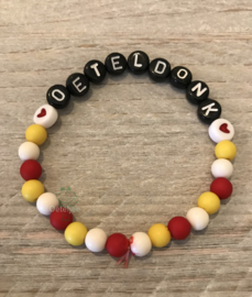 Armbandje met letters Oeteldonk zwart en hartjes