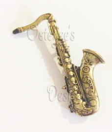 Broche saxofoon goud