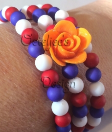 Armband rood wit blauw op spiraal met Holland bedel