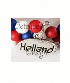 Armband rood wit blauw op spiraal met Holland bedel