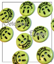 Felgele smiley knoopjes