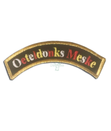 Geborduurd embleemrood wit geel met tekst "Oeteldonks Meske"