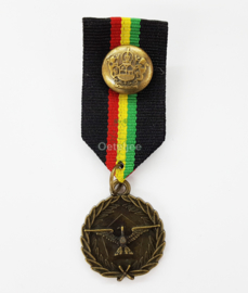 Medaille 10 blauw/ rood/ geel/ groen met wings oudbronskleur