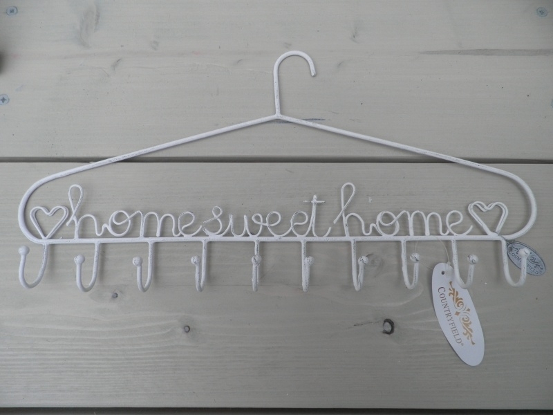 Wit ijzeren hanger met tekst HomeSweetHome
