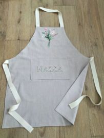 Keukenschort zand linnen veldboeket en naam bloemen in roze, lichtblauw, geel, wit