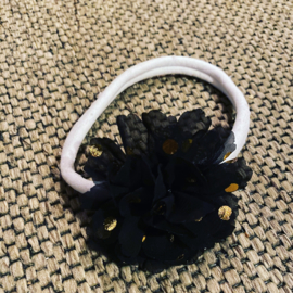 Nylon haarbandje zwarte bloem met gouden stip