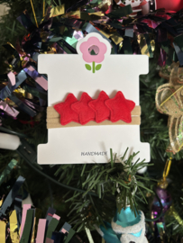 Haarbandje met rode sterren