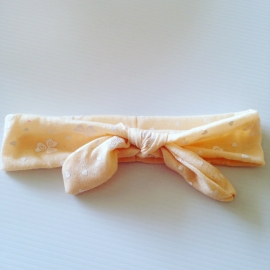 Knoop haarbandje Licht geel met hartjes