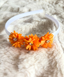 Diadeem met oranje bloemetjes