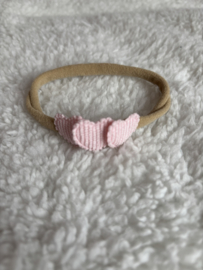Haarbandje met 3 roze hartjes