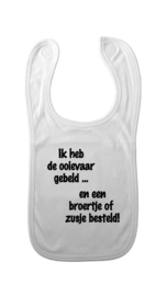 baby slabbetje: Ik heb de ooievaar gebeld en een broertje of zusje besteld!