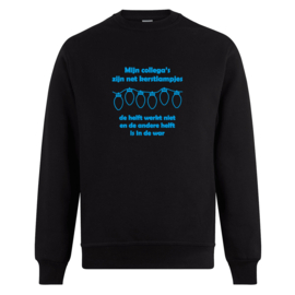 Foute kerst sweater: Mijn collega’s zijn net kerstlampjes, de helft werkt niet en de andere helft is in de war