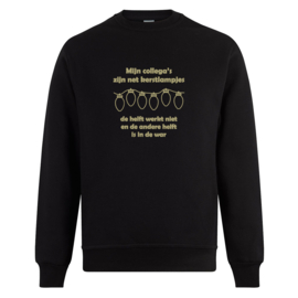Foute kerst sweater: Mijn collega’s zijn net kerstlampjes, de helft werkt niet en de andere helft is in de war