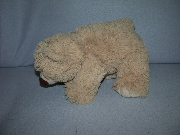B-972  Ostoy/Kika beer - 31 cm - kraaloogjes - oranje achterkant label