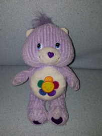 B-1765  Care Bears troetelbeertje Harmony met bloem - 21 cm