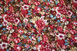 Een katoenen kapmanteltje in herfstsfeer met kersenrode bloemen. Nog 1 op voorraad.