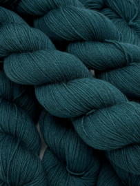 Dark teal green...