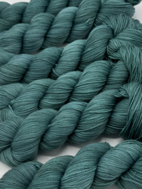 Greyish teal green...