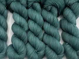 Greyish teal green...