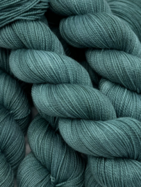 Greyish teal green...