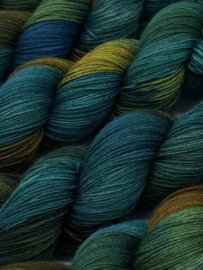 Dark teals & ochre...