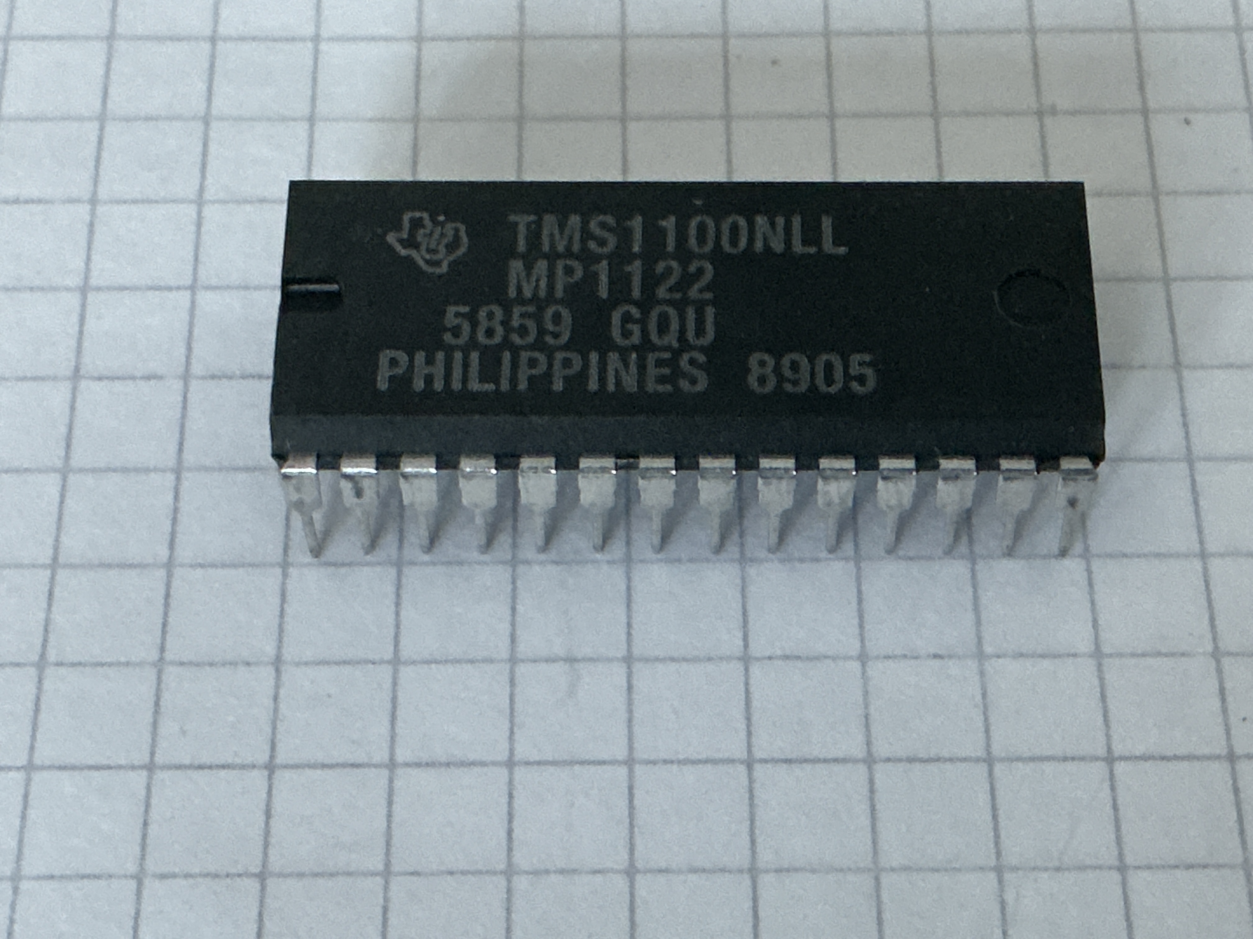 TMS1100